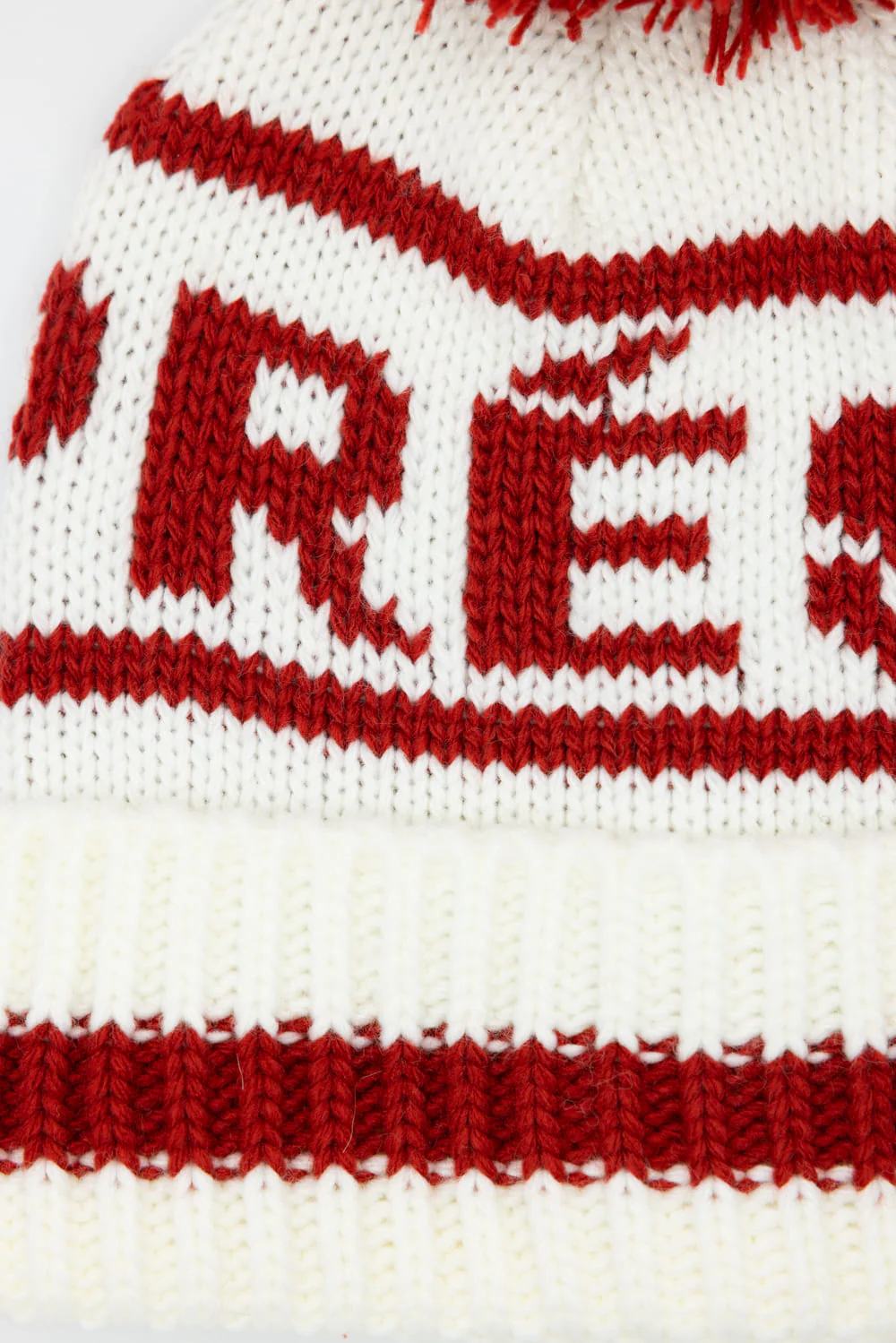 C.C. Apres Ski Yarn Pom Beanie for Women in Ivory/Red | HTE0134IVY - Image 2