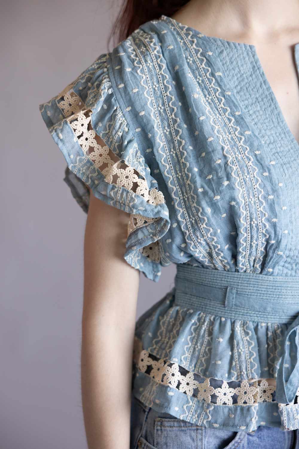 Strut & Bolt Embroidered Flutter Sleeve Peplum Top for Women in Chambray | T-50742-H-CHM - Image 2