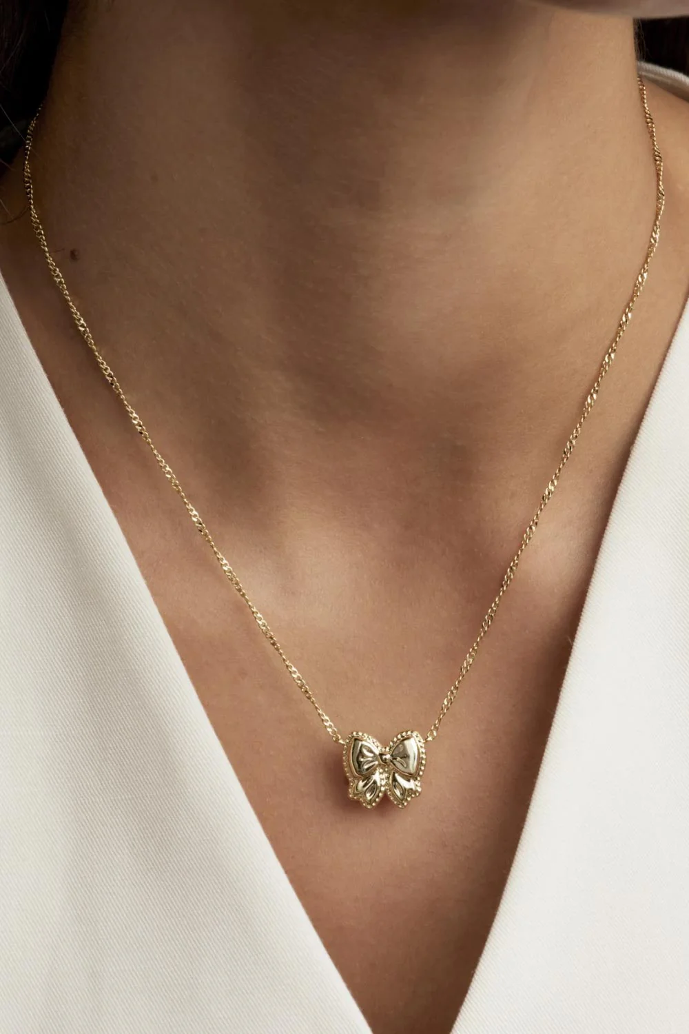 Kendra Scott Haley Bow Short Pendant Necklace in Gold | 9608886084 - Image 5